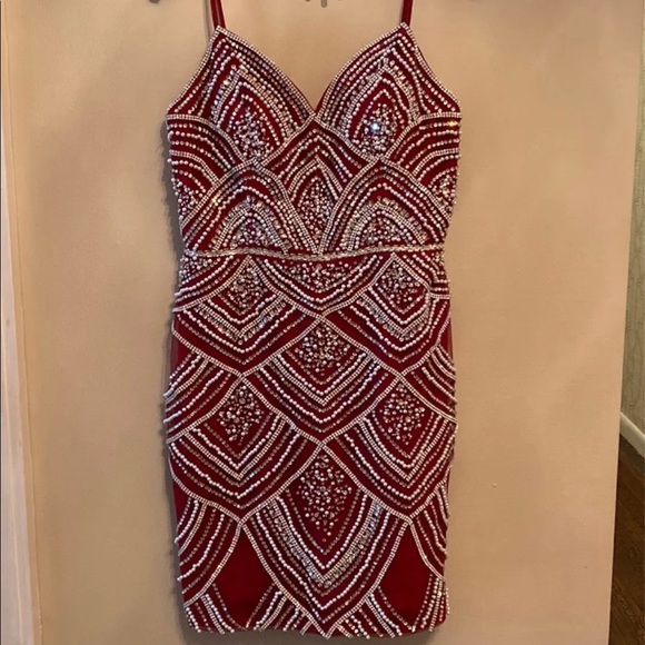 Selling a Jovani red dress . Was a size 10 altered to a size 6 - Picture 1 of 2